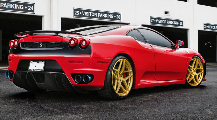 Gold Rims on Red Car